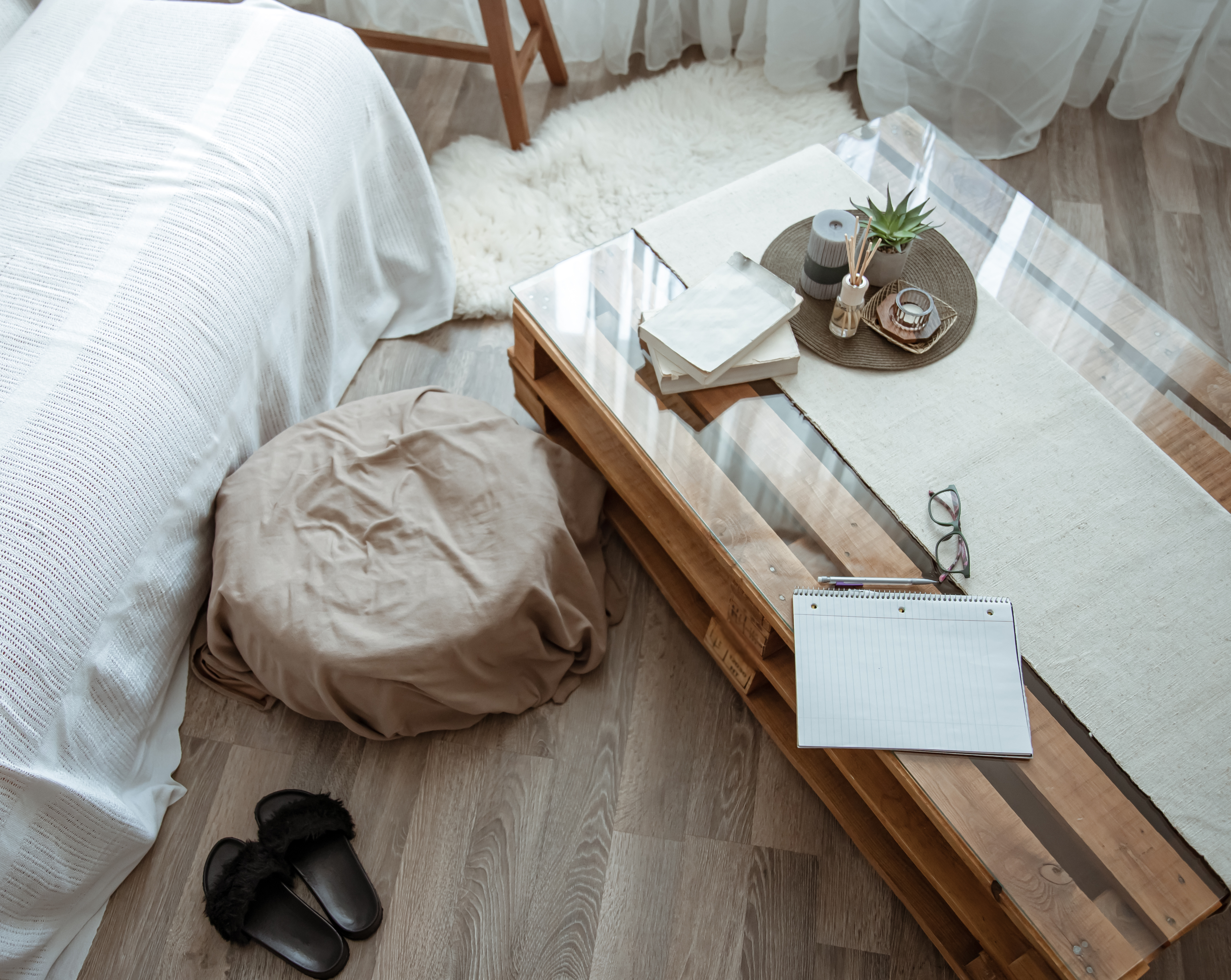 A cozy, sunlit bedroom with personal belongings.